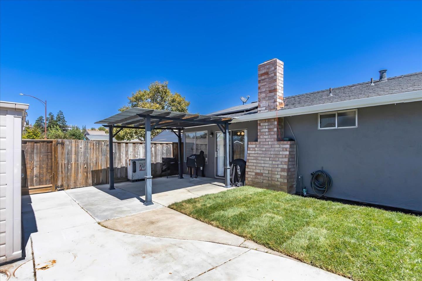 5075 Eppling Lane San Jose, CA 95111 - Photo 33 of 60 a front view of a house with a yard