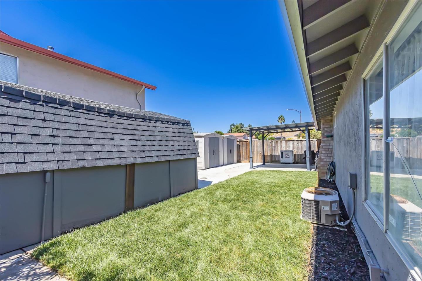 5075 Eppling Lane San Jose, CA 95111 - Photo 35 of 60 a front view of a house with a yard