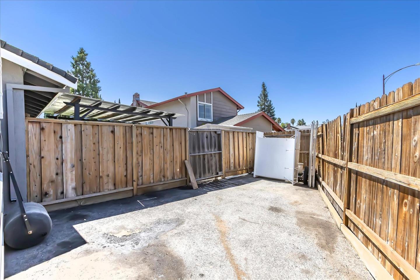 5075 Eppling Lane San Jose, CA 95111 - Photo 37 of 60 a view of a house with wooden fence