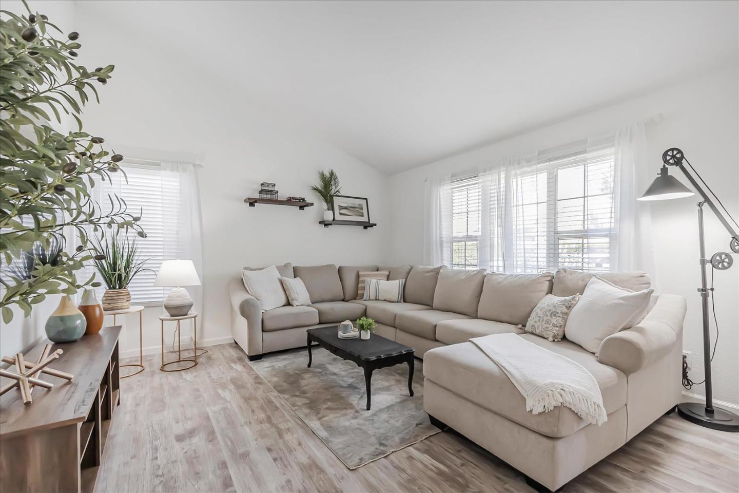5075 Eppling Lane San Jose, CA 95111 - Photo 9 of 60 a living room with furniture and a large window