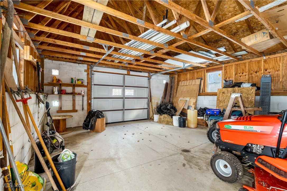 1037 Atkins Road Geneva, OH 44041 - Photo 36 of 50 Detached outbuilding providing additional storage and versatile space for tools and equipment.