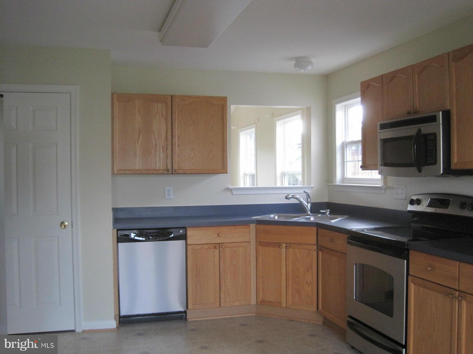 172 Ranson Estates Circle Ranson, WV 25438 - Photo 8 of 22 Kitchen With Pass Through to Living Room