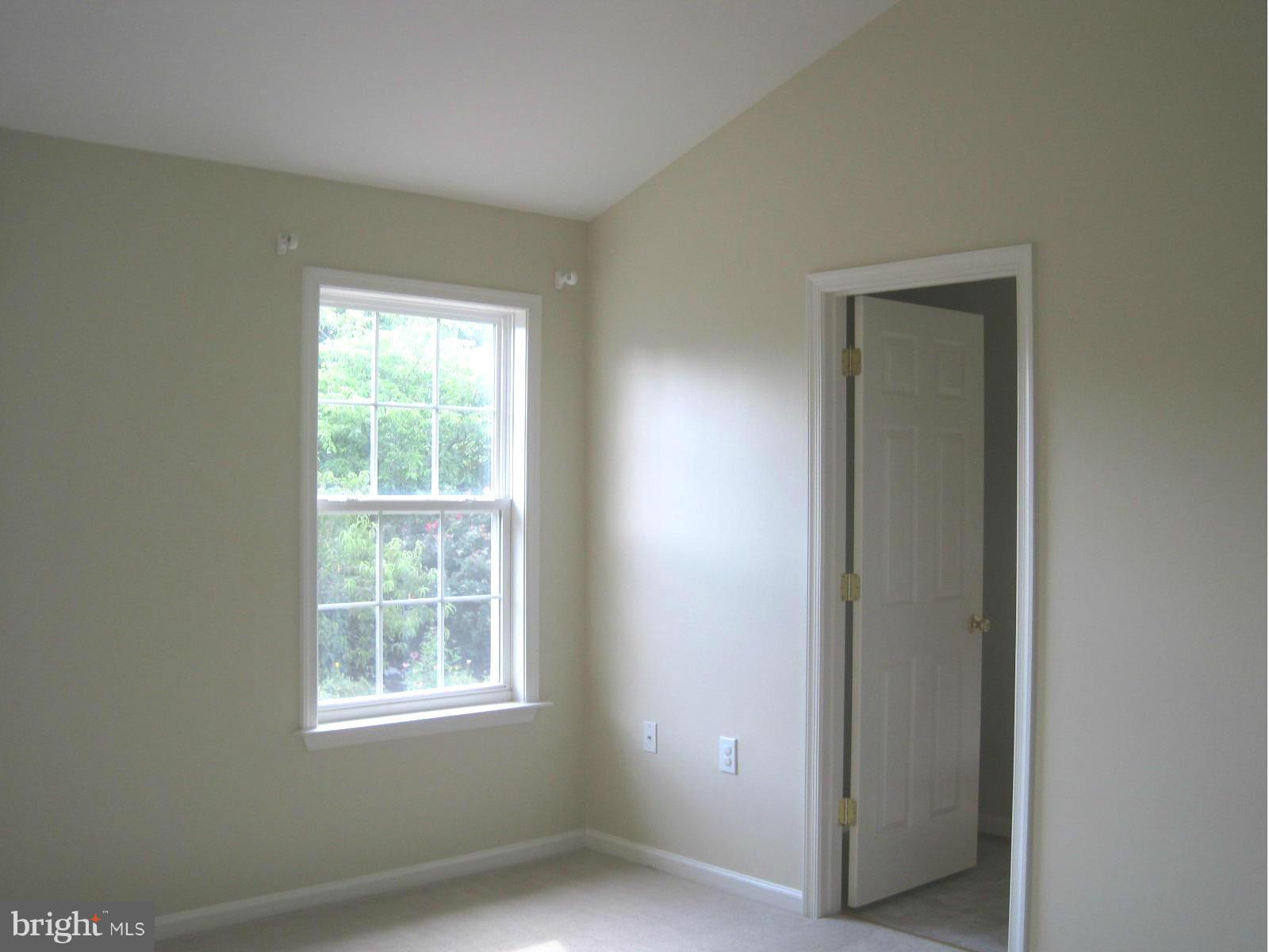 172 Ranson Estates Circle Ranson, WV 25438 - Photo 9 of 22 Master bedroom with vaulted ceiling