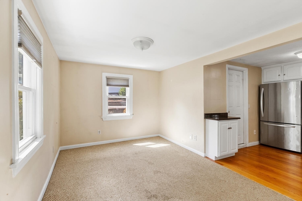 14 Rockwood Road Lynnfield, MA 01940 - Photo 15 of 29 a view of a kitchen with a stove cabinets and a wooden floor