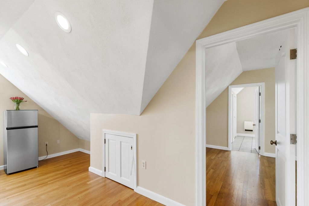 14 Rockwood Road Lynnfield, MA 01940 - Photo 22 of 29 a view of a hallway with wooden floor
