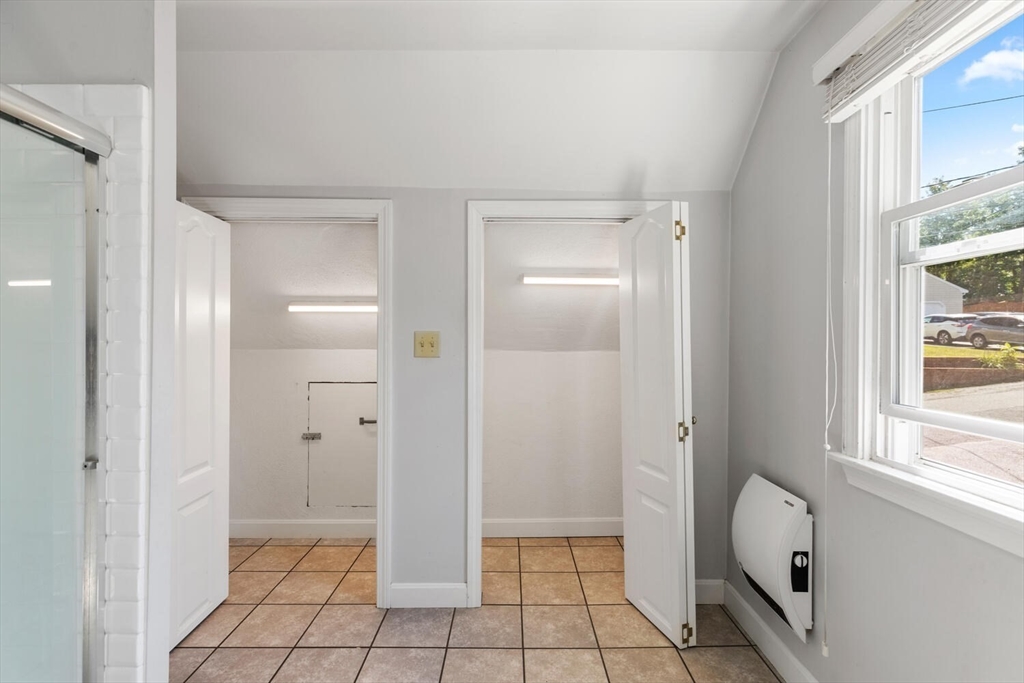14 Rockwood Road Lynnfield, MA 01940 - Photo 27 of 29 a bathroom with a granite countertop sink and a mirror