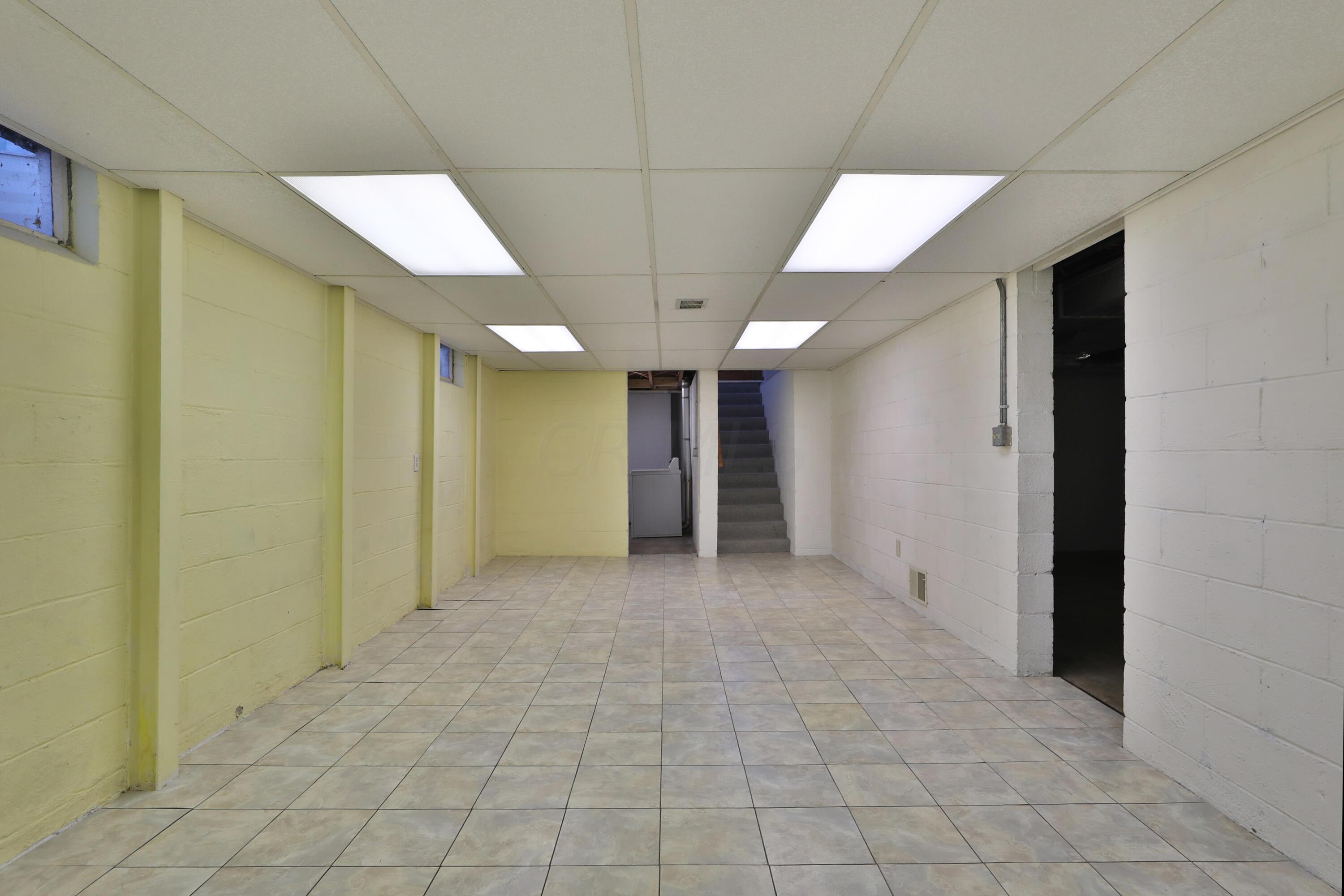 3231 Somerford Road Columbus, OH 43221 - Photo 25 of 35 Tile Flooring, Dropped Ceiling with I-Beams installed