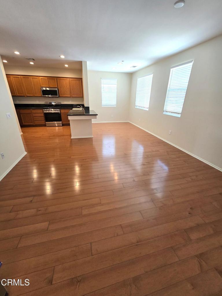 3319 North Ventura Road Oxnard, CA 93036 - Photo 4 of 25 a view of kitchen with microwave and furniture