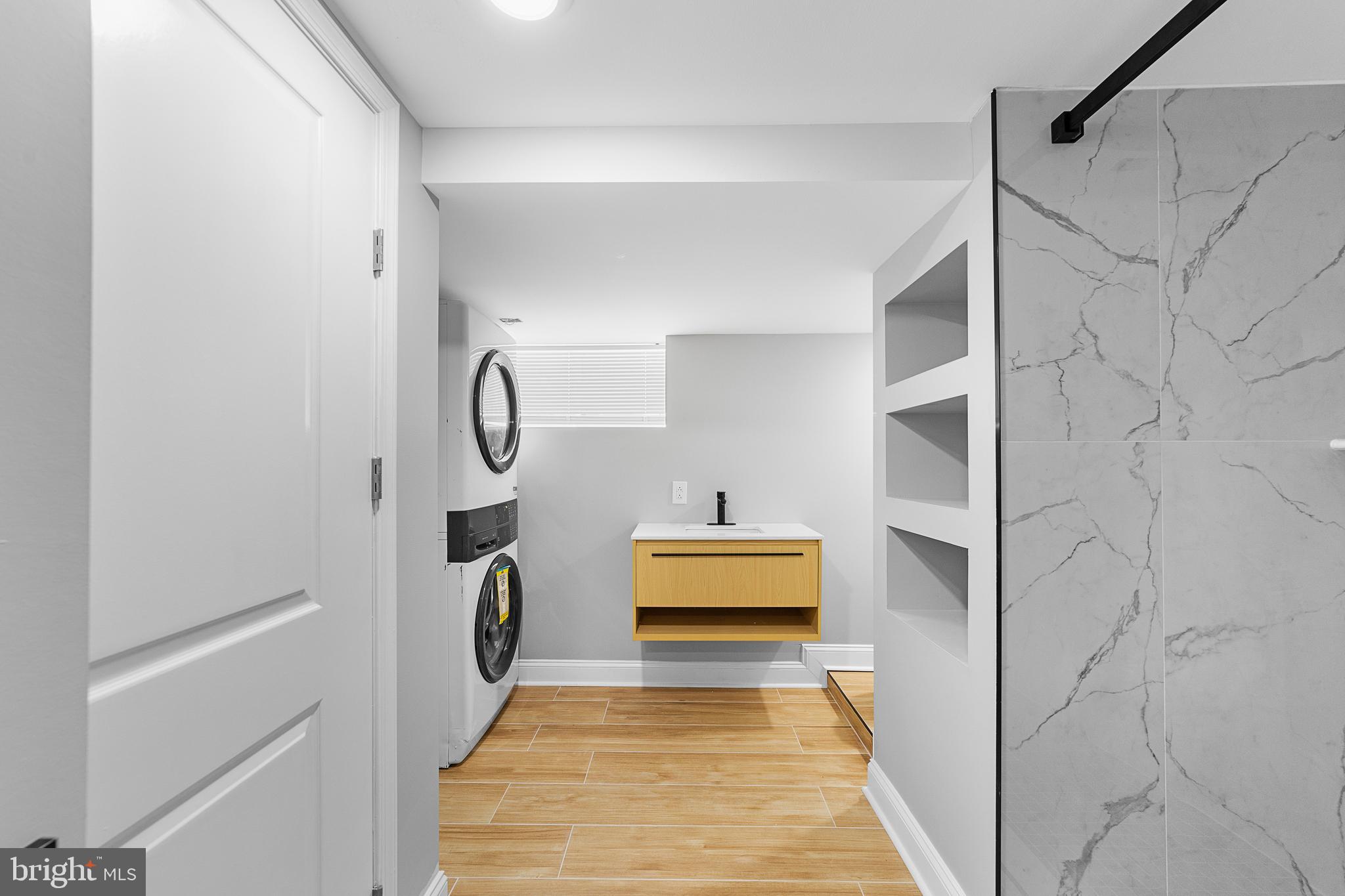 1925 Auth Street Philadelphia, PA 19124 - Photo 14 of 31 Lower Level Laundry Area in Bathroom