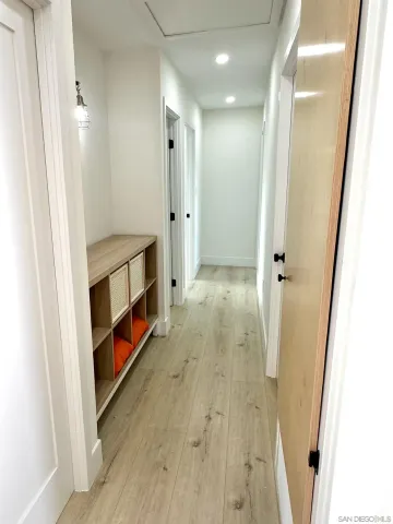 a view of a hallway with closet
