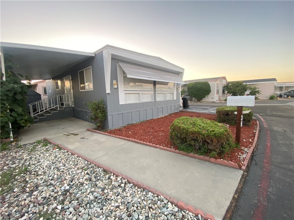 35 Orange Via Anaheim, CA 92801 - Photo 3 of 21 a front view of a house with a yard