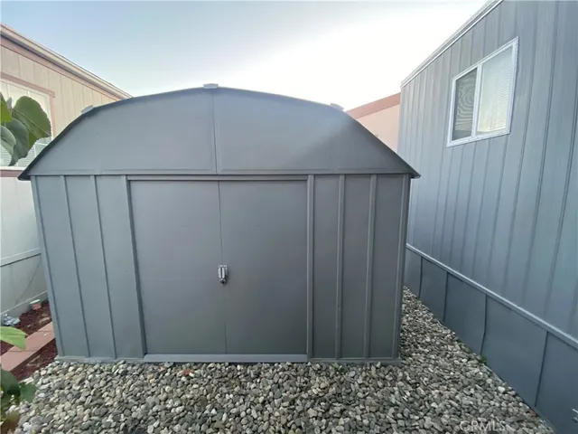 a wooden door in front of a house