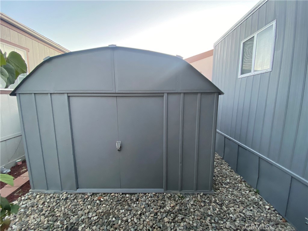 35 Orange Via Anaheim, CA 92801 - Photo 6 of 21 a wooden door in front of a house