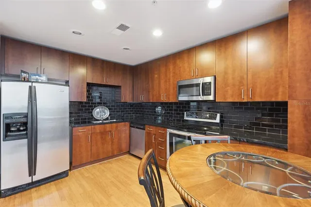 a outdoor space with furniture and flat screen tv