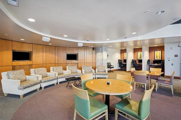 a view of a back yard from the corridor