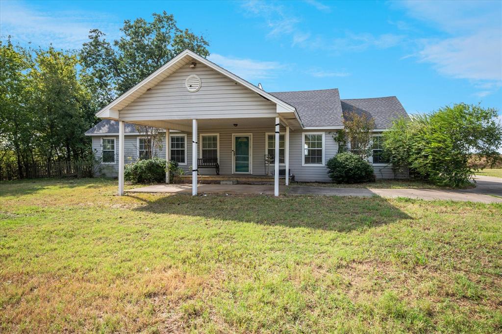 9828 County Road Alvarado, TX 76009 - Photo 2 of 20 a front view of a house with a yard
