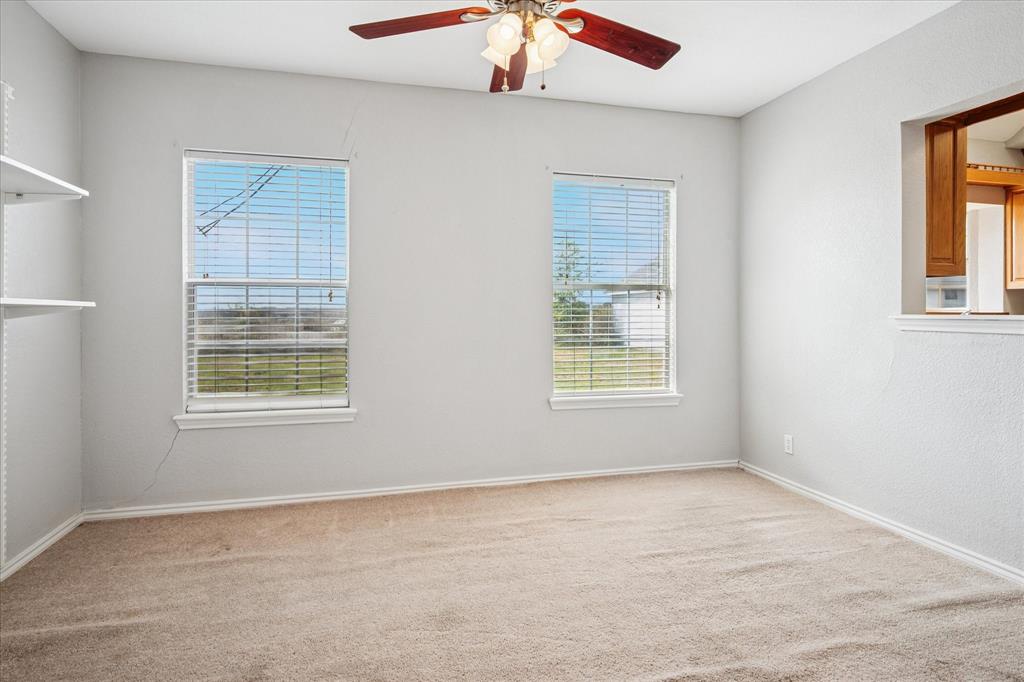 9828 County Road Alvarado, TX 76009 - Photo 8 of 20 a view of an empty room with a window