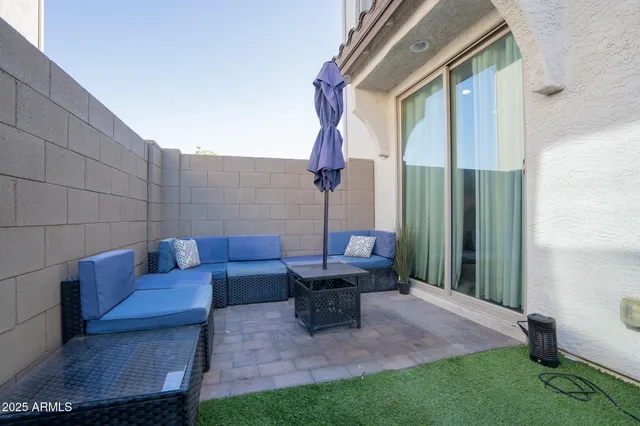 a building outdoor space with patio furniture