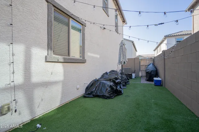 a room with a bed and a window