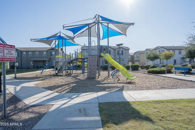 a view of a park with a slide