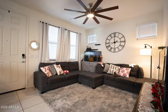 a living room with furniture and a window