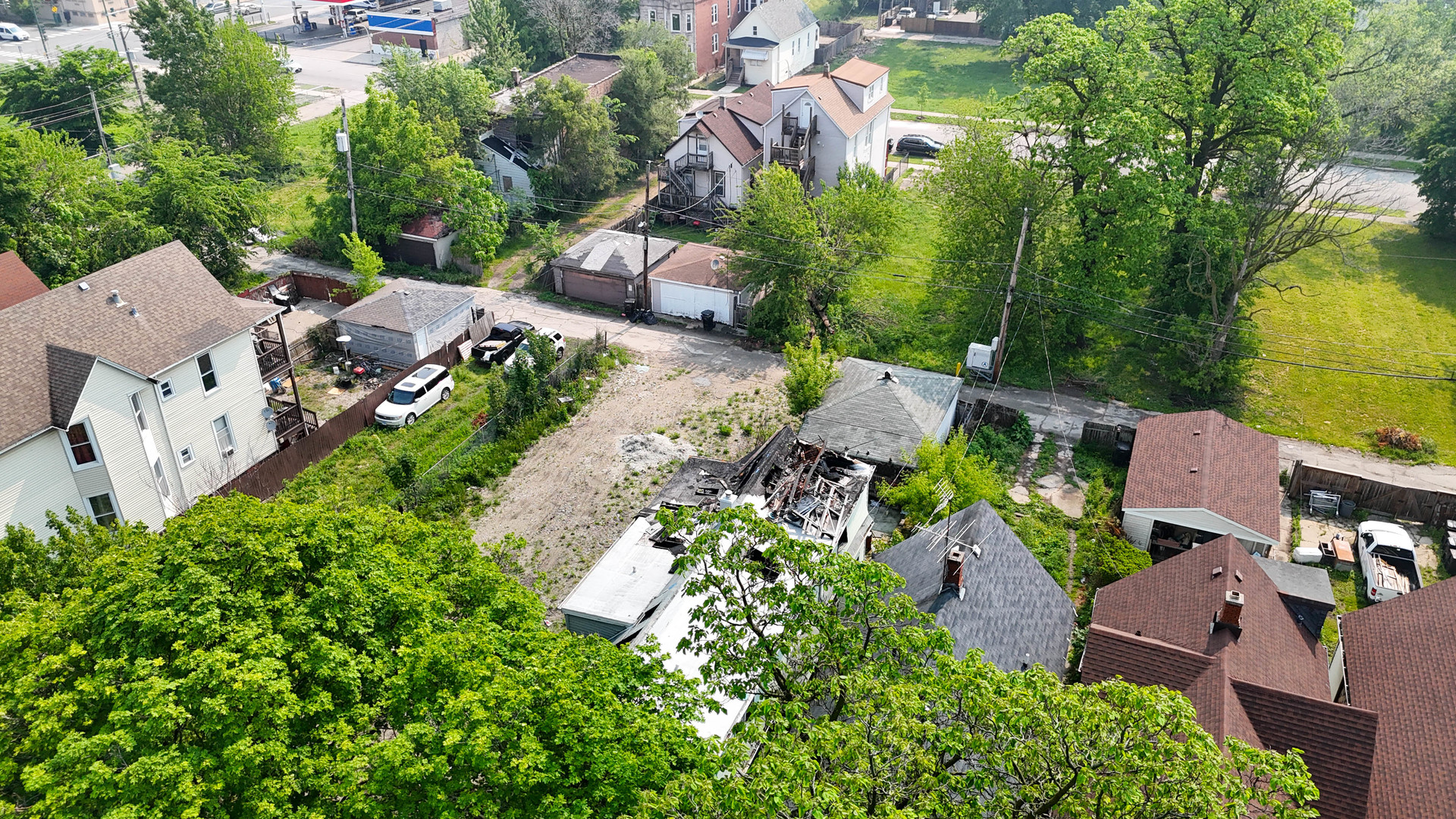 5935 South Carpenter Street Chicago, IL 60621 - Photo 4 of 6 an aerial view of multiple houses with yard