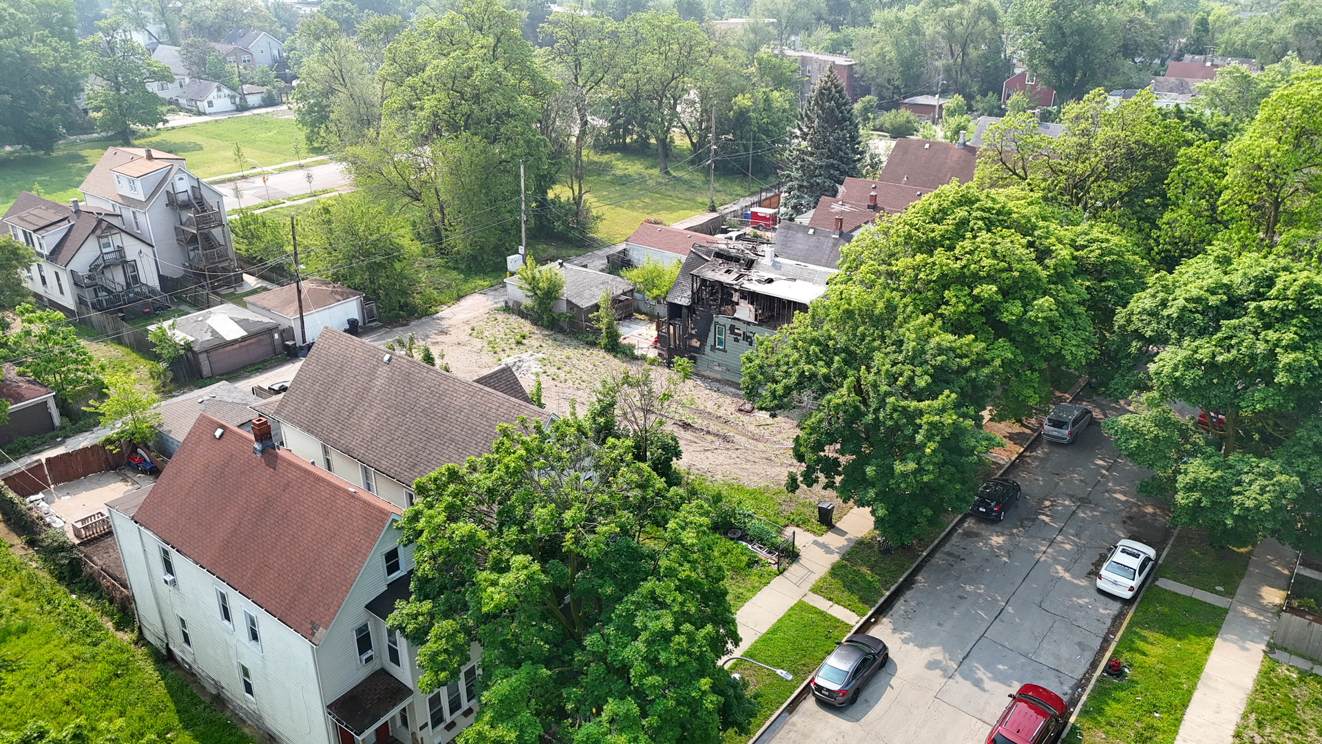 5935 South Carpenter Street Chicago, IL 60621 - Photo 6 of 6 an aerial view of a house with a yard