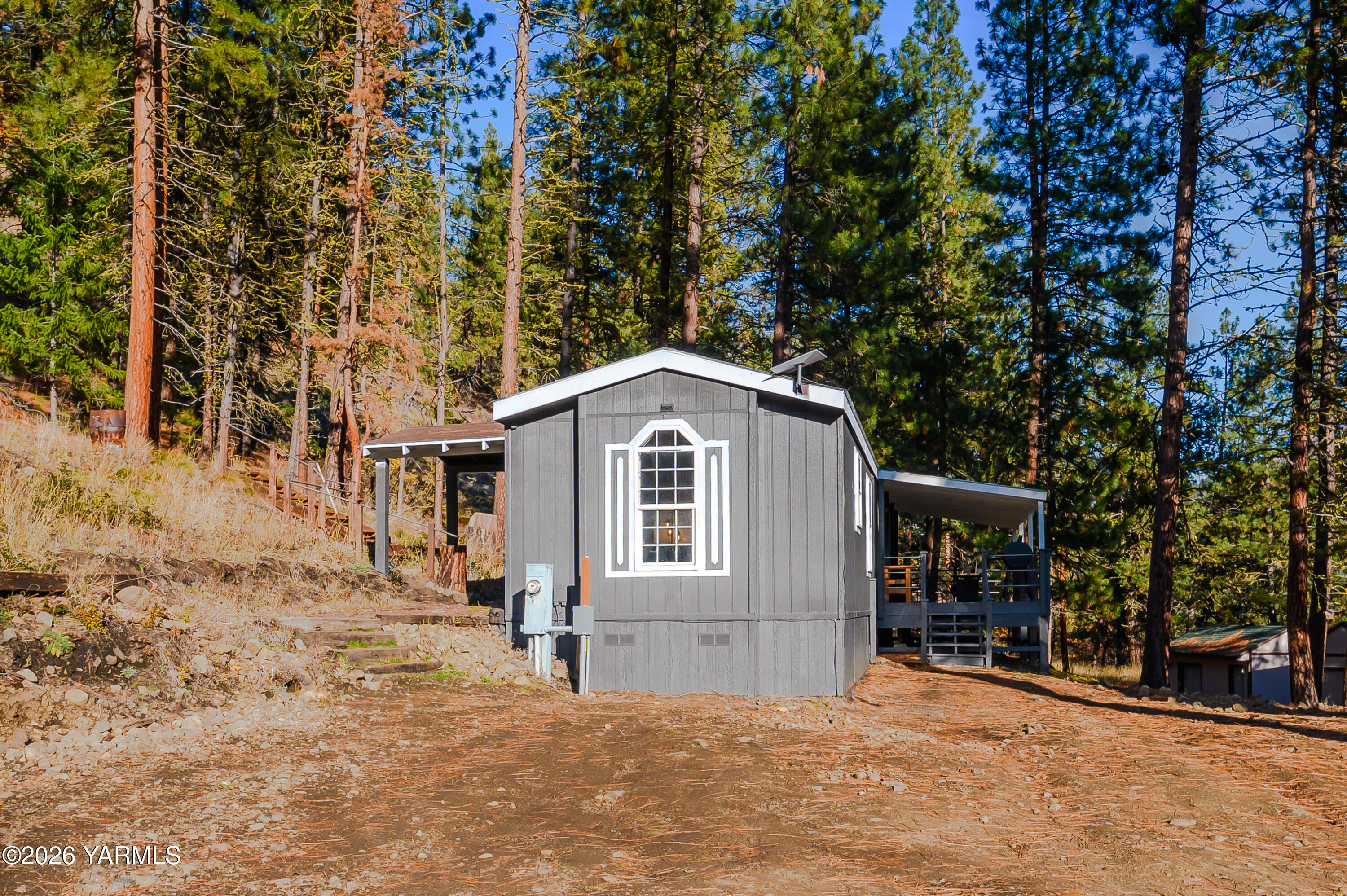 6371 Fork Road North Yakima, WA 98903 - Photo 11 of 19 a front view of a house with a yard