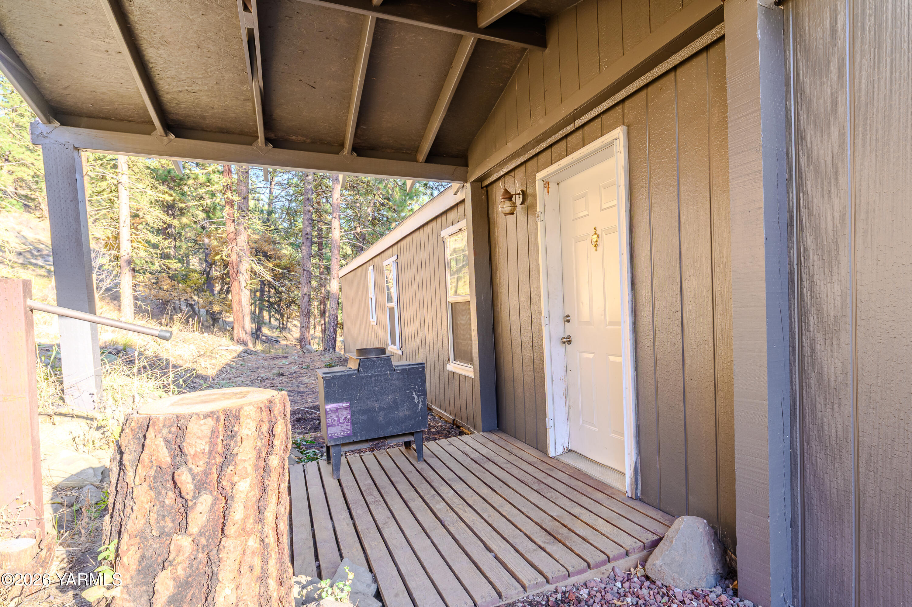 6371 Fork Road North Yakima, WA 98903 - Photo 13 of 19 a bedroom with a bed and wooden floor