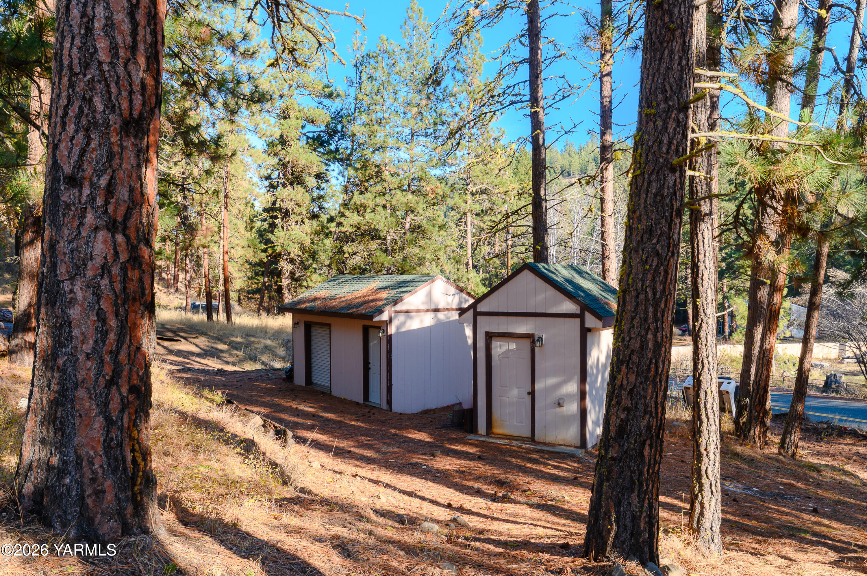 6371 Fork Road North Yakima, WA 98903 - Photo 17 of 19 a front view of a house with a yard