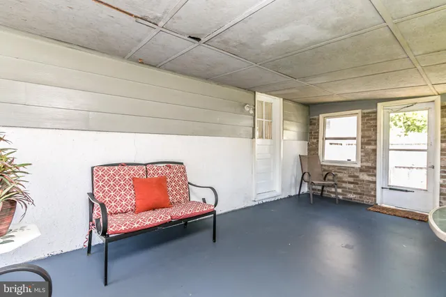 a view of backyard and tree