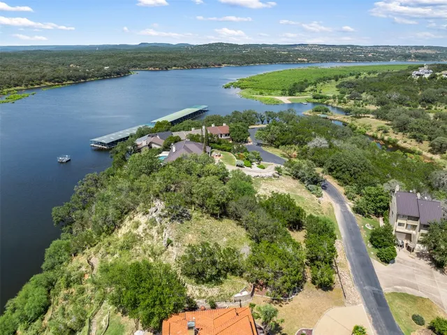 a view of lake with green space