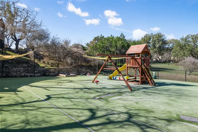 a view of park with a slide
