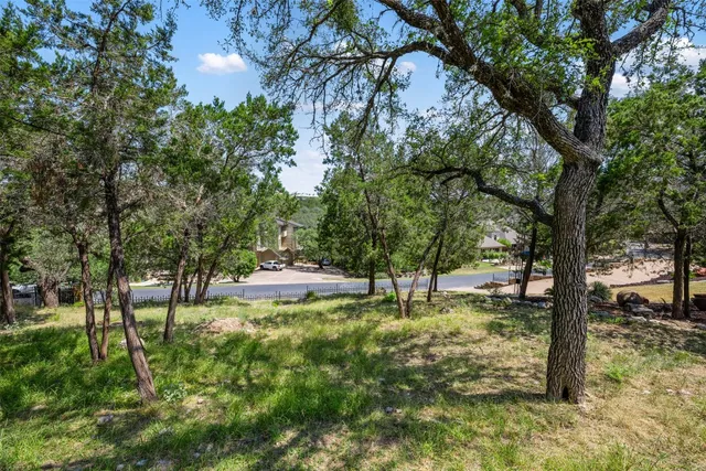 a view of swimming pool with a yard