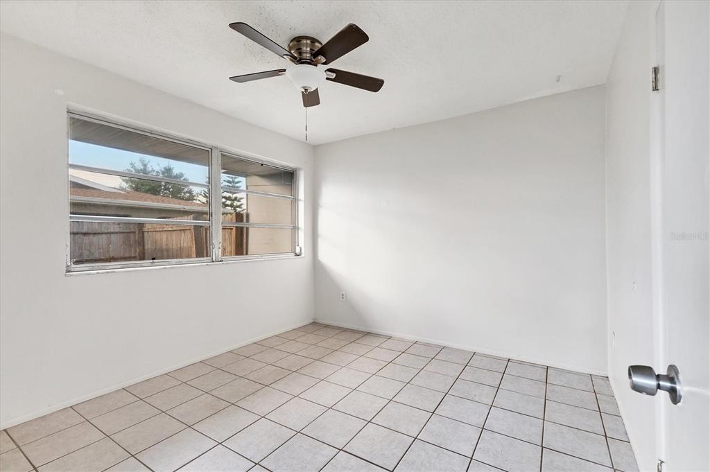 2529 Ednor Street Port Charlotte, FL 33952 - Photo 12 of 23 a view of an empty room with a window