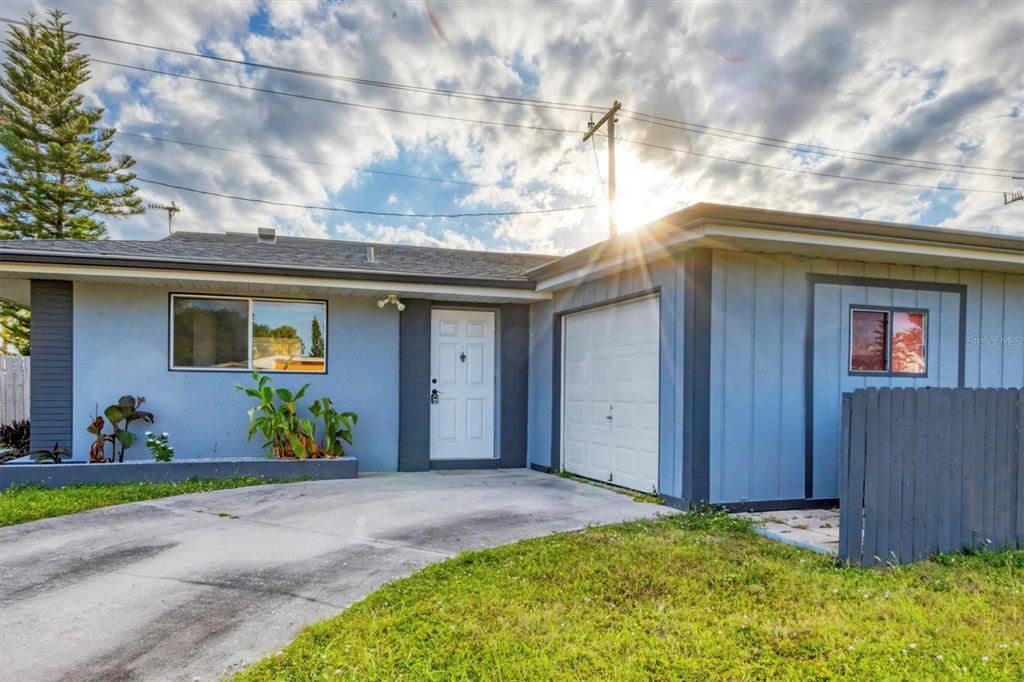 2529 Ednor Street Port Charlotte, FL 33952 - Photo 21 of 23 a front view of house with yard