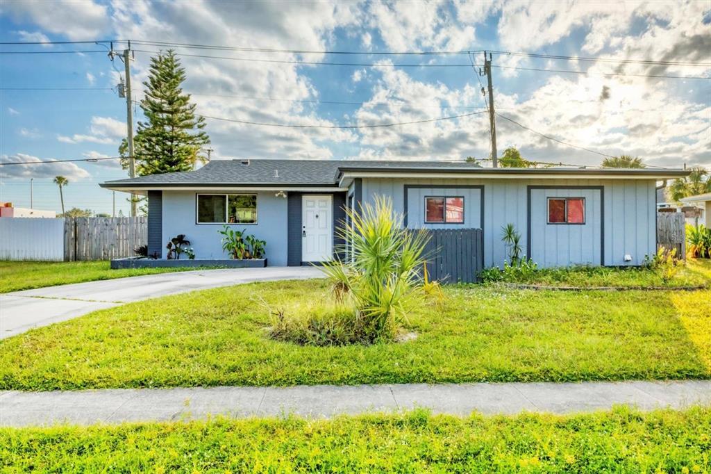 2529 Ednor Street Port Charlotte, FL 33952 - Photo 23 of 23 a front view of a house with a yard