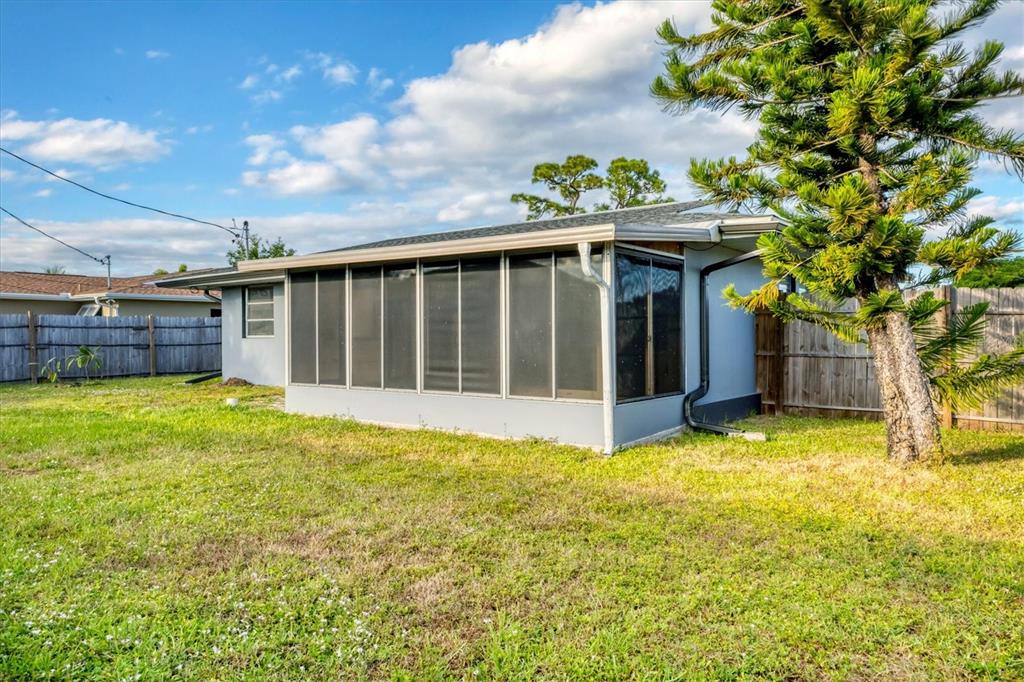 2529 Ednor Street Port Charlotte, FL 33952 - Photo 3 of 23 a view of a house with a yard and sitting area