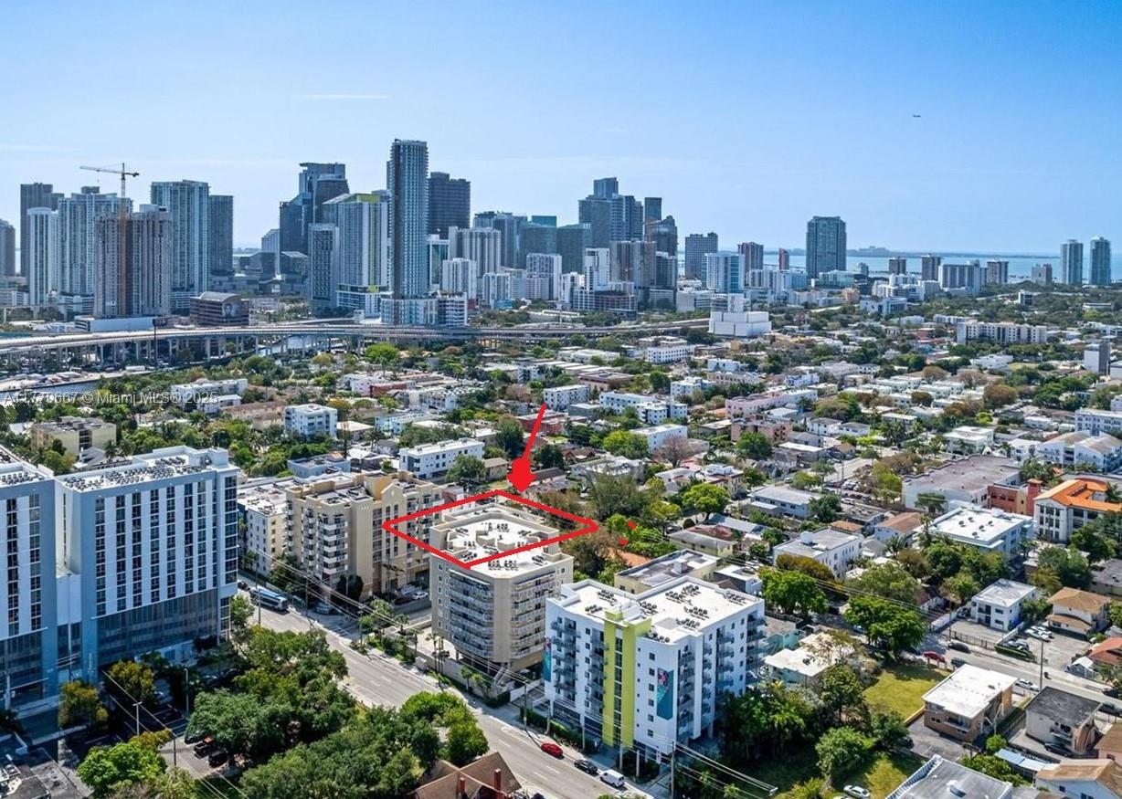 102 Southwest 6th Avenue, Unit 701 Miami, FL 33130 - Photo 1 of 25 a view of a city with tall buildings