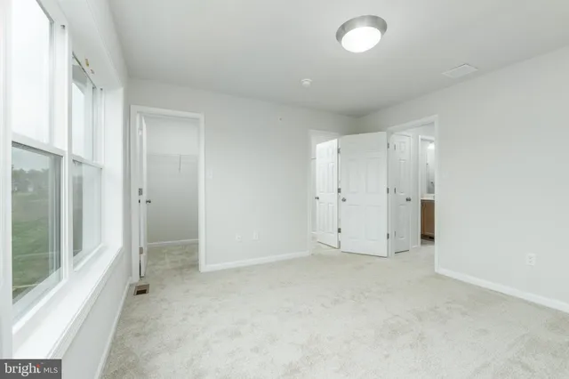 a view of a room with racks on the wall