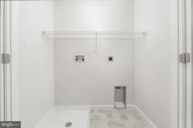 a view of a room with racks on the wall