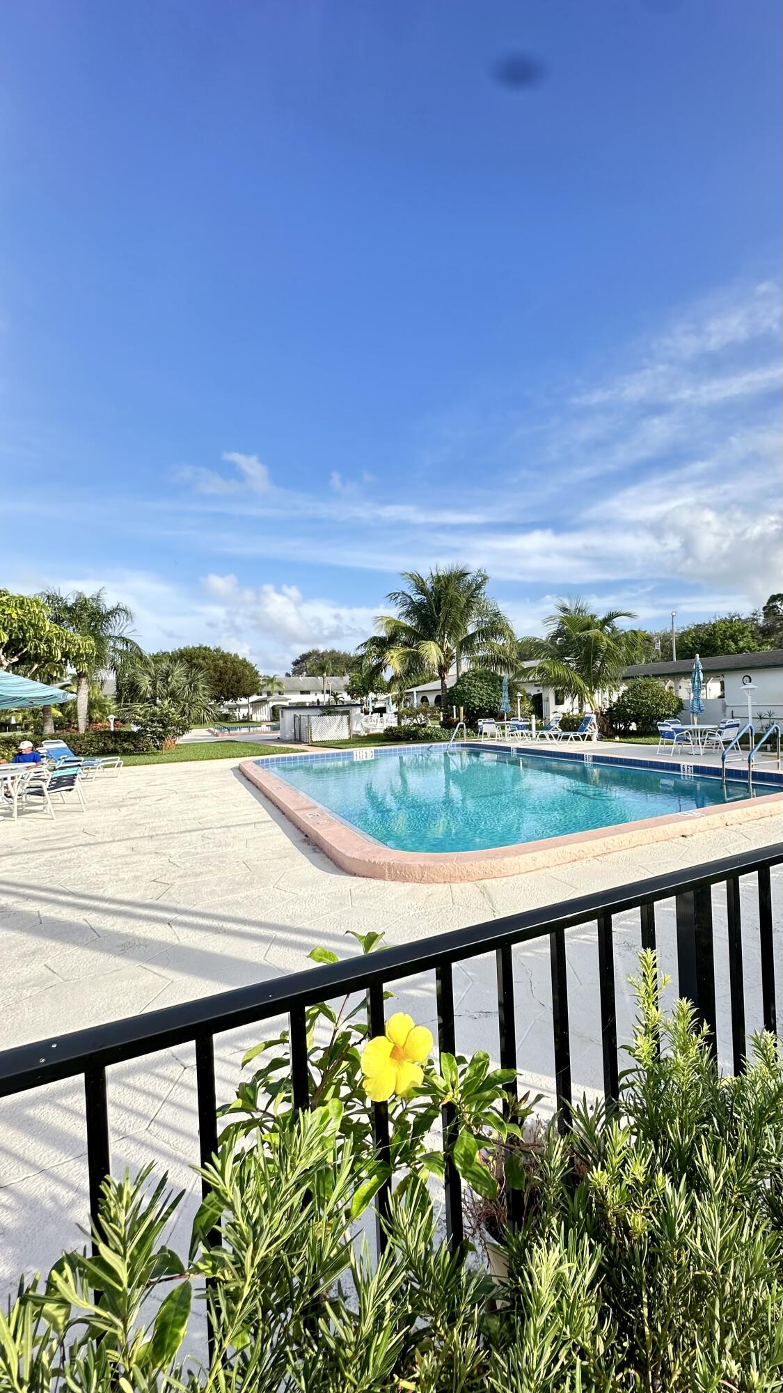 3 Garden Street, Unit 105K Tequesta, FL 33469 - Photo 15 of 41 a view of swimming pool from a balcony