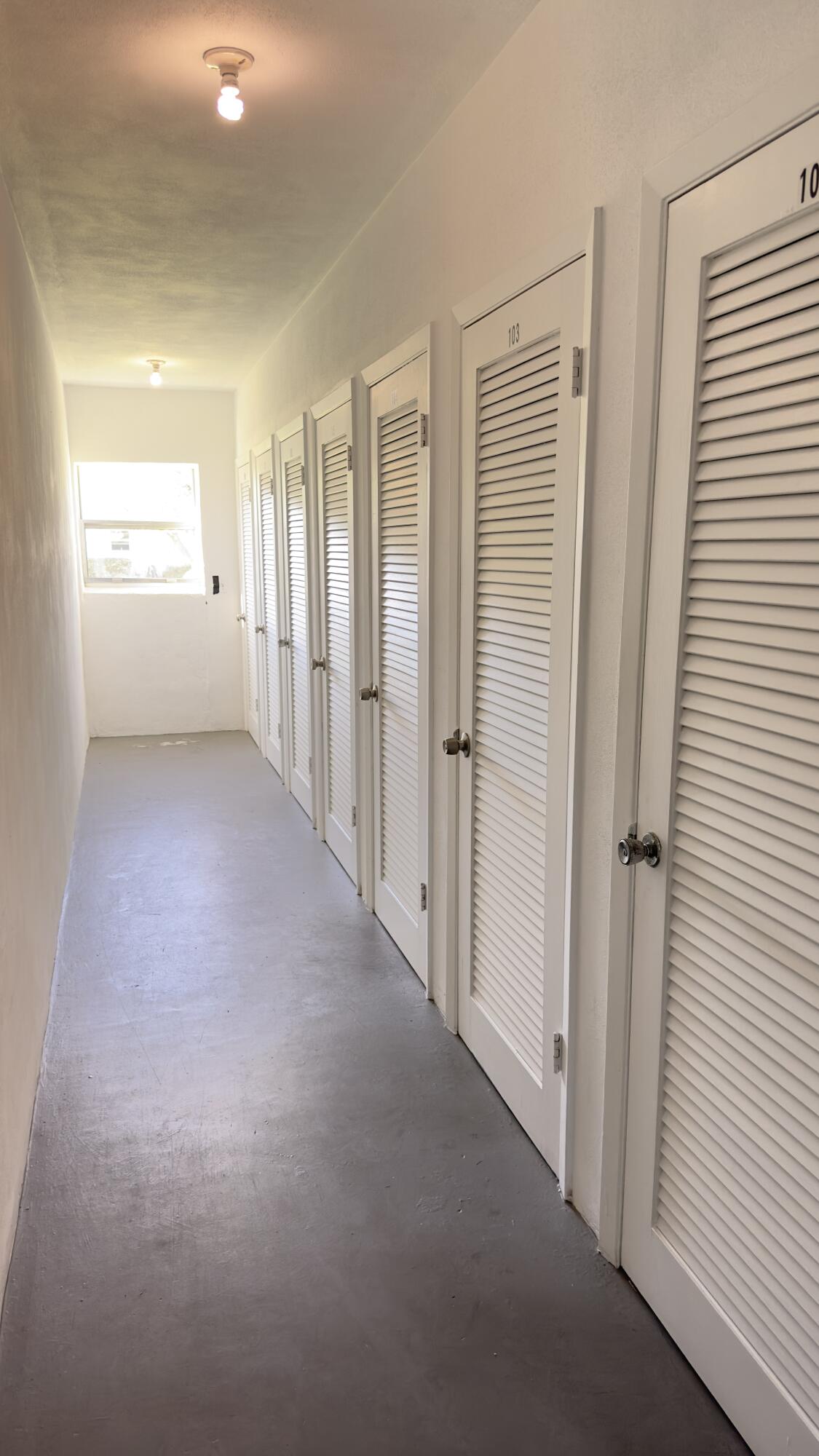 3 Garden Street, Unit 105K Tequesta, FL 33469 - Photo 26 of 41 a view of a hallway with an entryway and closet area