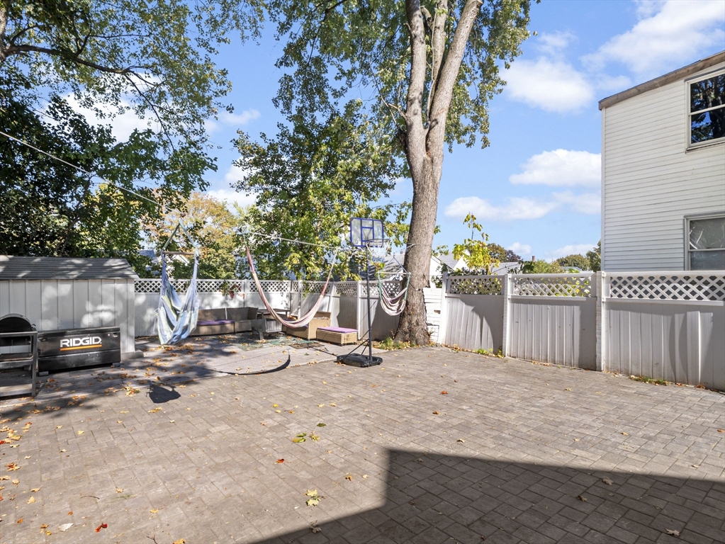 85 B Street Lowell, MA 01851 - Photo 35 of 42 a view of a houses with snow on the road