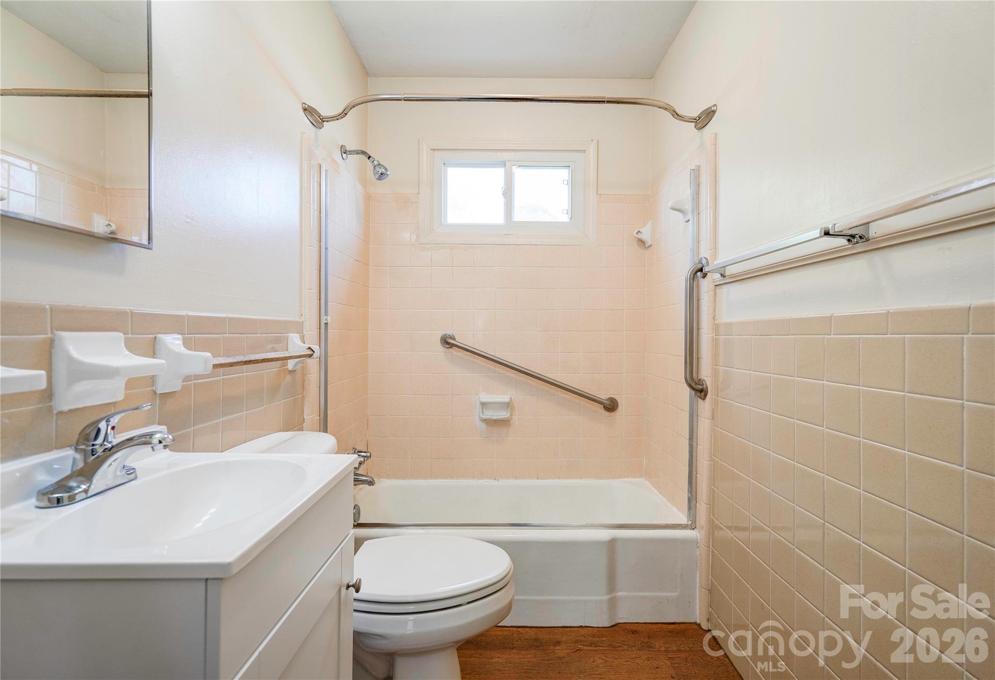 1904 Sulphur Springs Road Shelby, NC 28152 - Photo 15 of 27 a bathroom with a sink a toilet and shower