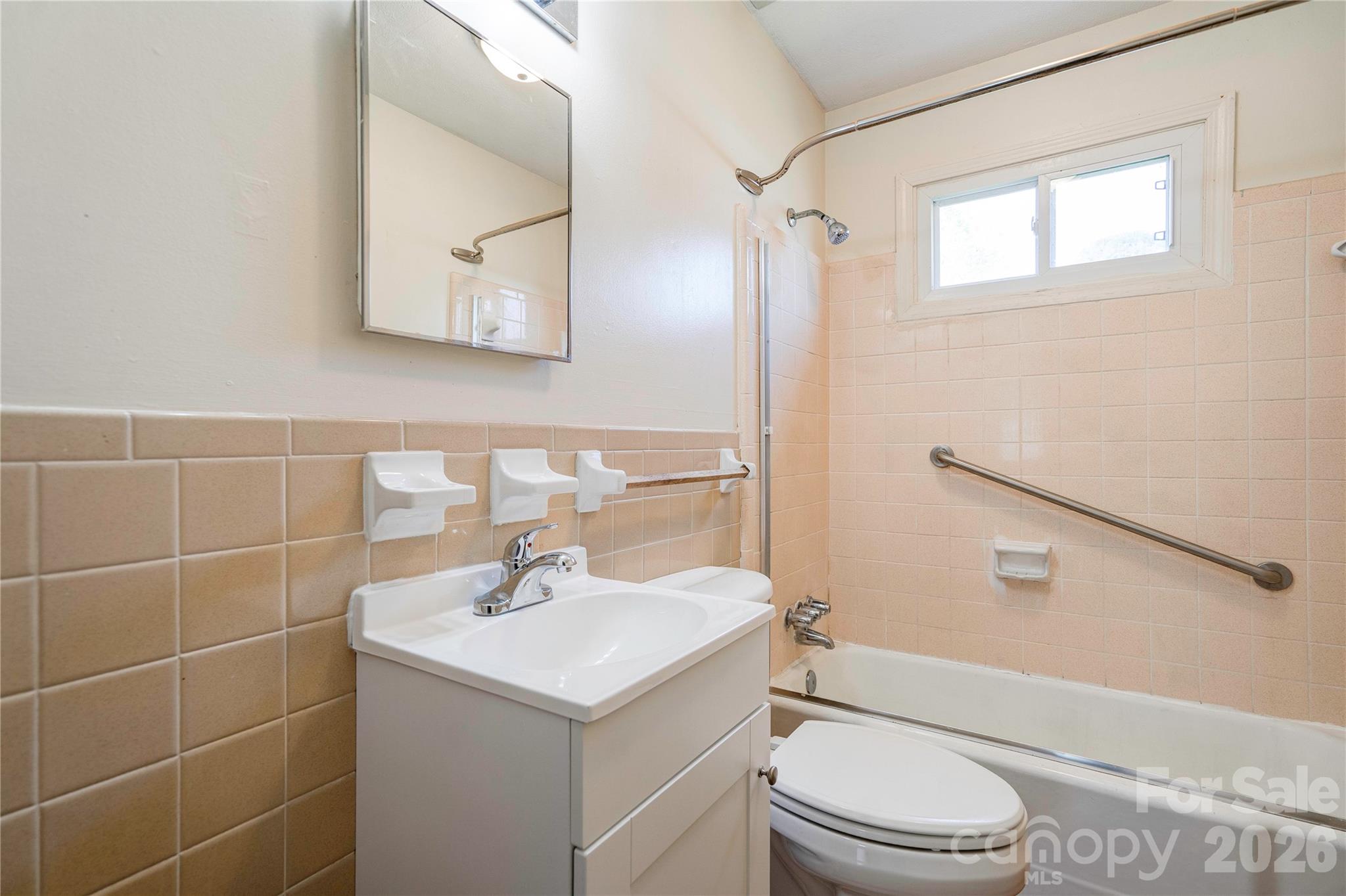 1904 Sulphur Springs Road Shelby, NC 28152 - Photo 16 of 27 a bathroom with a sink toilet and shower