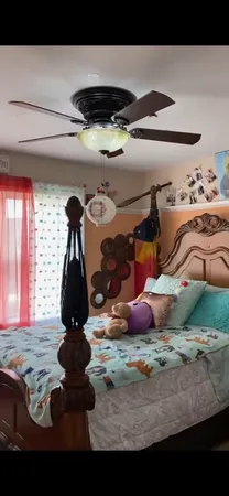 a room with lots of different colored cloths