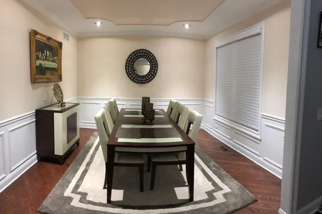 a living room with a couch and a table