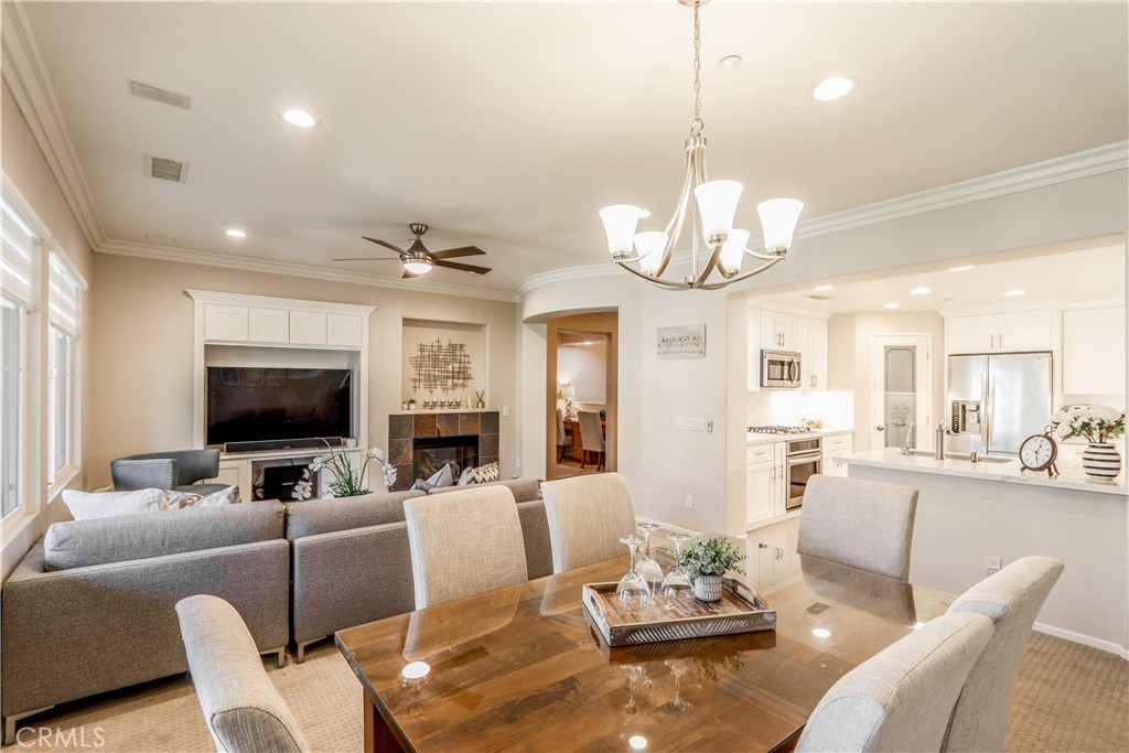264 Lockford Irvine, CA 92602 - Photo 2 of 15 a living room with fireplace furniture and a flat screen tv