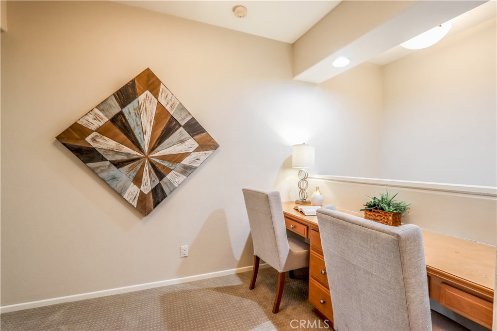264 Lockford Irvine, CA 92602 - Photo 7 of 15 a workspace room with furniture and a potted plant